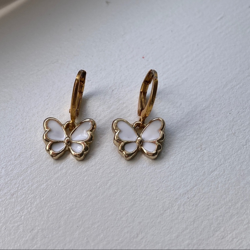 gold and white butterfly hoops